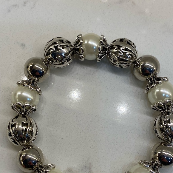 Scroll bracelet. Never worn. Retailed for $28. Asking $22. - Picture 6 of 6